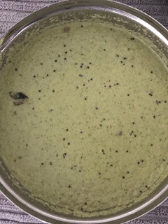 A picture of Coriander leaves coconut Chutney/ Green chutney.