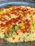 Risoto de queijo brie com presunto crocante e rúcula