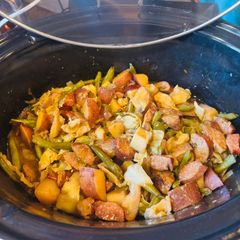 A picture of Slow Cooker Cajun Sausage and Potatoes (serve over rice).