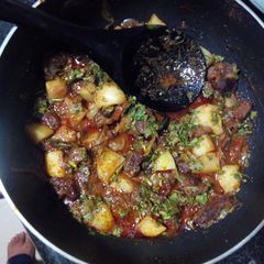 A picture of Rich Brown Beef Potatoes Casserole.