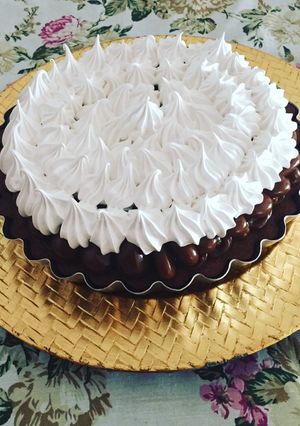 Una foto de Brownie con dulce de leche y Merengue