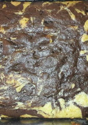 Una foto de Bizcochuelo de naranja y chocolate sin batidora