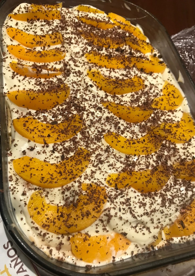 Una foto de Postre de vainillas y duraznos 🍑