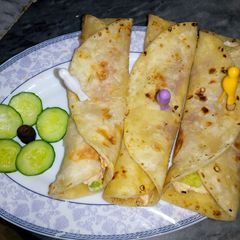 A picture of Chicken egg paratha roll.
