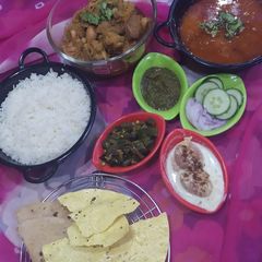 A picture of Kathal with steamed rice and dal fry.