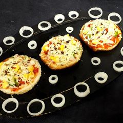 A picture of Mini bread pizza.