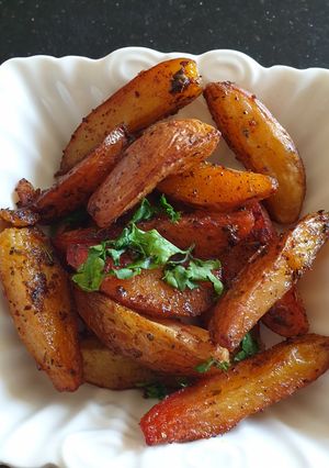 A picture of Potatoe wedges#4week challenge# charity challenge.