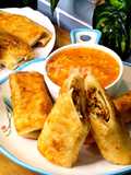 Veg And Chicken Spring Rolls With Homemade Sheets Or Wraps Along With Spring Roll Sauce