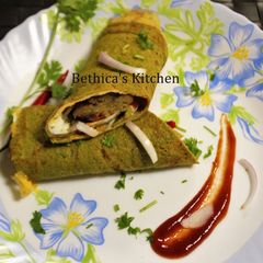 A picture of Kids Tiffin - Stuffed oats Cheela.
