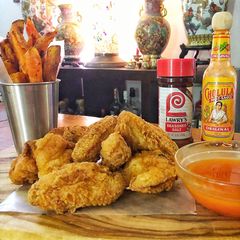 A picture of Fried Chicken Wings with Spicy Honey Butter.