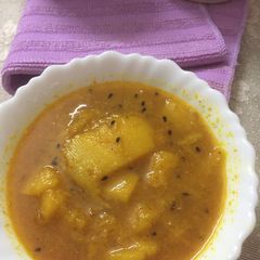 A picture of Kachche aam ki khatti meethi sabji.