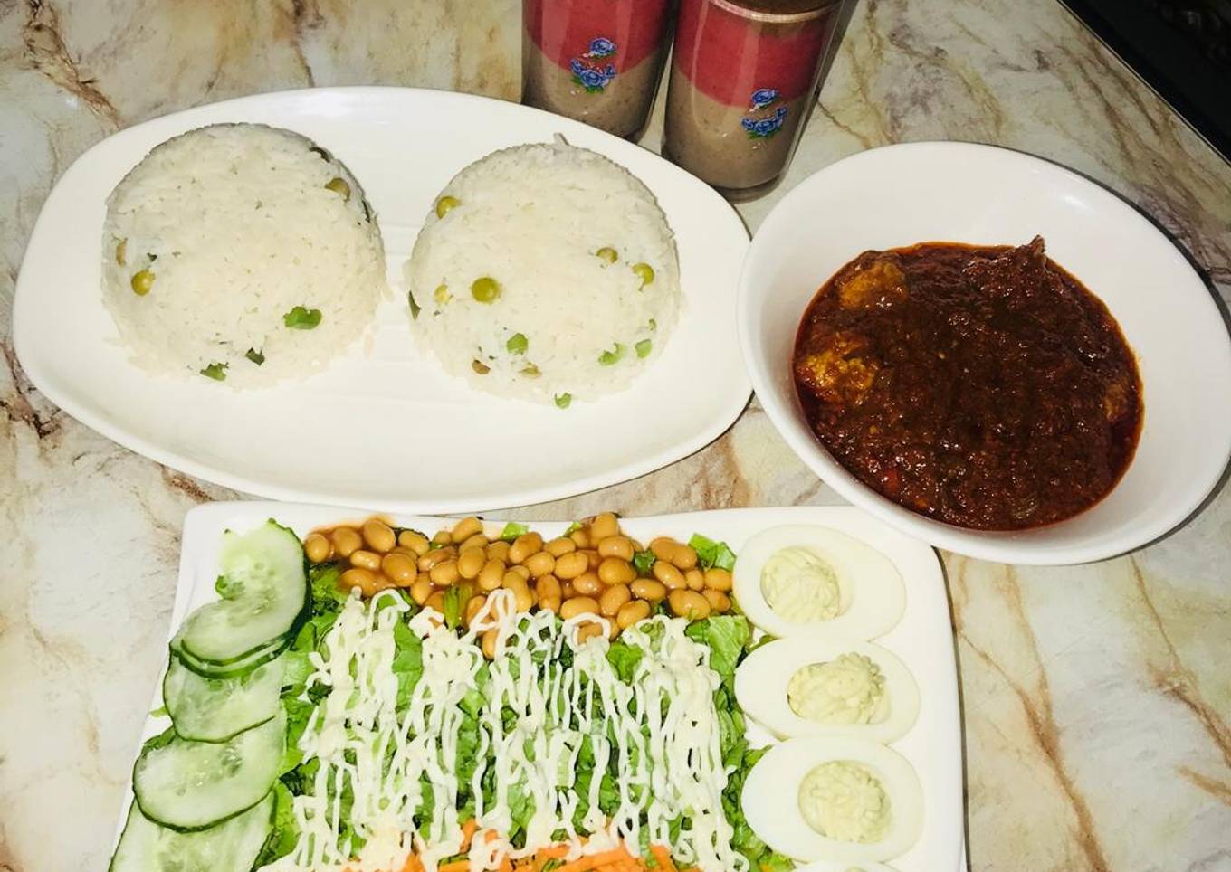 White rice wt chicken ball stew &salad wt devilled eggs