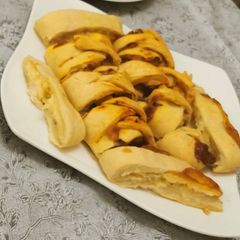 A picture of Cheesy chicken and egg stuffed bread.