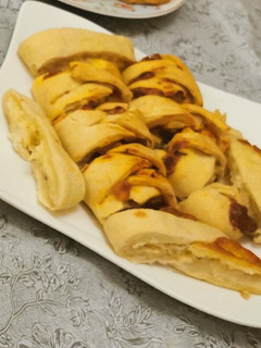 A picture of Cheesy chicken and egg stuffed bread.