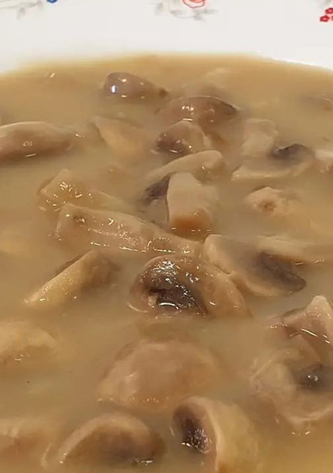 Una foto de Champiñones en salsa