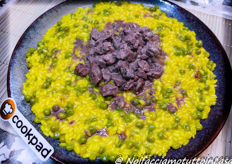 Risotto allo zafferano, fegatini di pollo e piselli