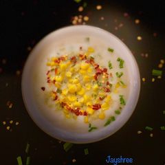 A picture of Coconut corn and lemongrass soup.