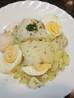 Una foto de Bacalao en salsa verde