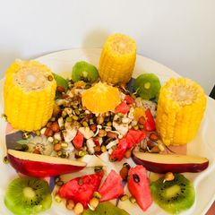 A picture of Sprouts  fruits and corn salad.