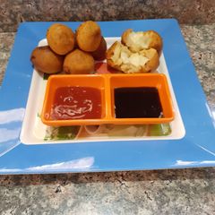A picture of Cheese aloo bonda /cheese potato bonda.