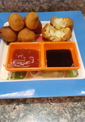A picture of Cheese aloo bonda /cheese potato bonda.