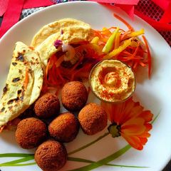 Pita bread with falafel hummus sandwich A picture of Pita bread with falafel hummus sandwich.