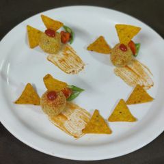 A picture of Baked bread nacchos fritters.