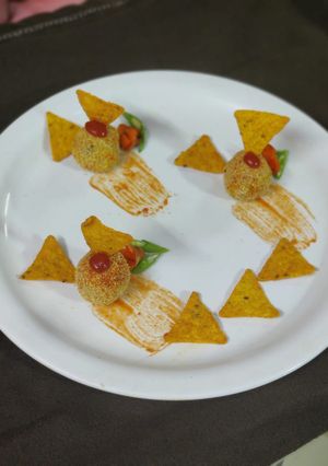 A picture of Baked bread nacchos fritters.