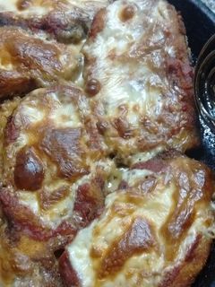 Una foto de Milanesas de berenjena a la napolitana