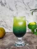 Es Jeruk Sirup Bunga Telang