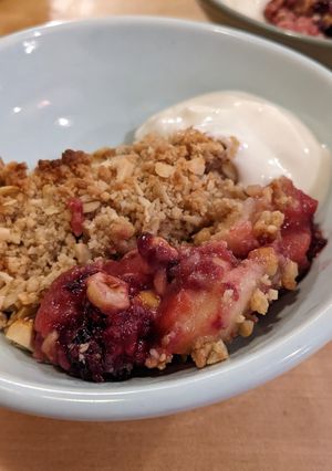 A picture of Keep-warm apple + blackberry crumble w/ hazelnut top.