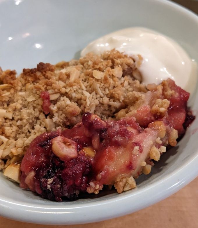 A picture of Keep-warm apple + blackberry crumble w/ hazelnut top.