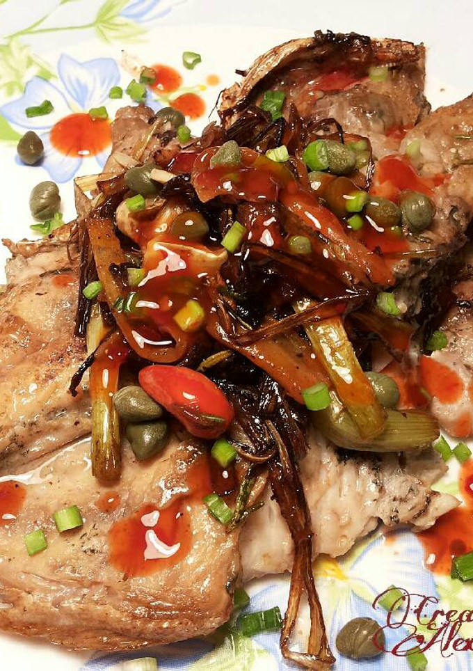 Una foto de Besugo con salteado de verduras, en agridulce y toque de picante