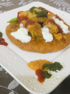 A picture of Aloo Kachori Chaat.