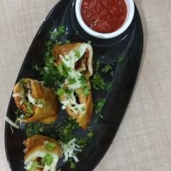 A picture of Cheesy Jini Dosa.
