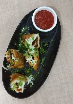 A picture of Cheesy Jini Dosa.