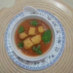 A picture of Tomato soup (jain).