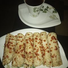 A picture of Pancake and sauce.