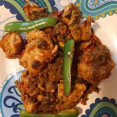 A picture of Karela chicken (Bitter Guord with chicken).