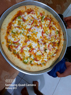 صورة لوصفة بيتزا