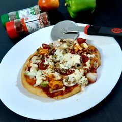 No Oven Baking paneer pizza A picture of No Oven Baking paneer pizza.