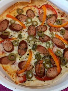 Una foto de Pizza con pan sash