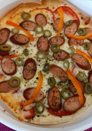 Una foto de Pizza con pan sash