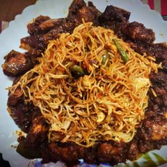 A picture of Chilli chicken with veg chaw.