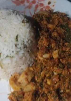 A picture of Rice & water leaf sauce.