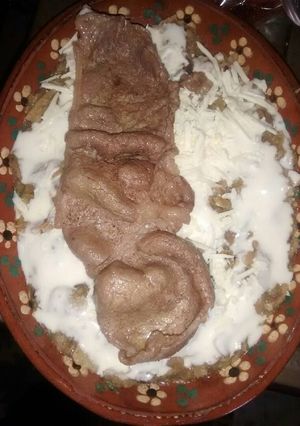 Una foto de Chilaquiles con bistec de res