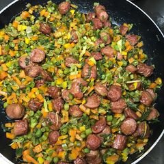 A picture of Veggies and sausage.