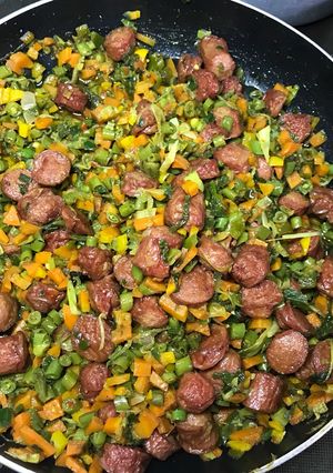 A picture of Veggies and sausage.