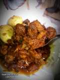 Plantain and kpomo sauce