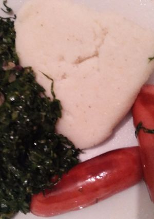 A picture of Ugali, fried lakes with smokies.